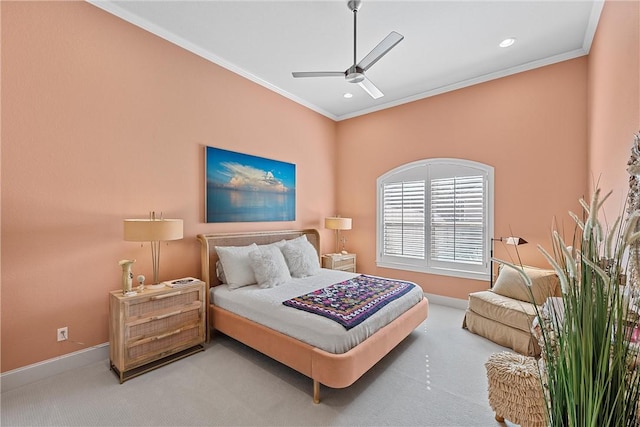 carpeted bedroom with ceiling fan and crown molding