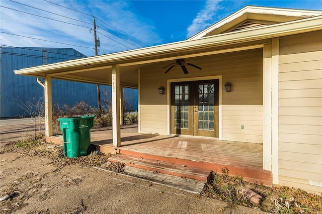 entrance to property with ceiling fan and french doors