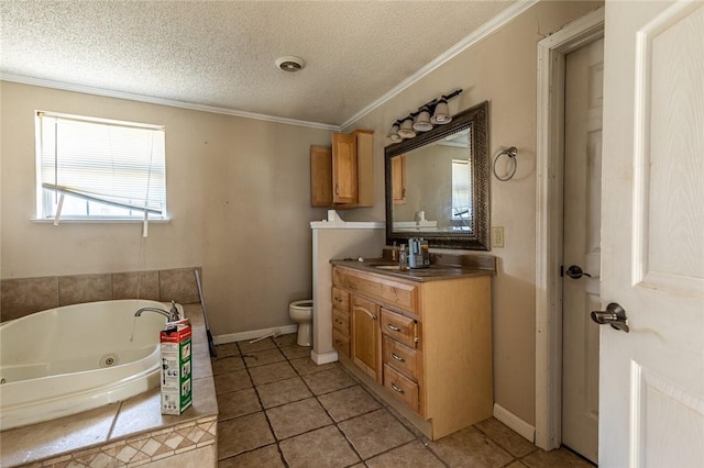 bathroom featuring ornamental molding, a textured ceiling, vanity, tile patterned flooring, and a tub