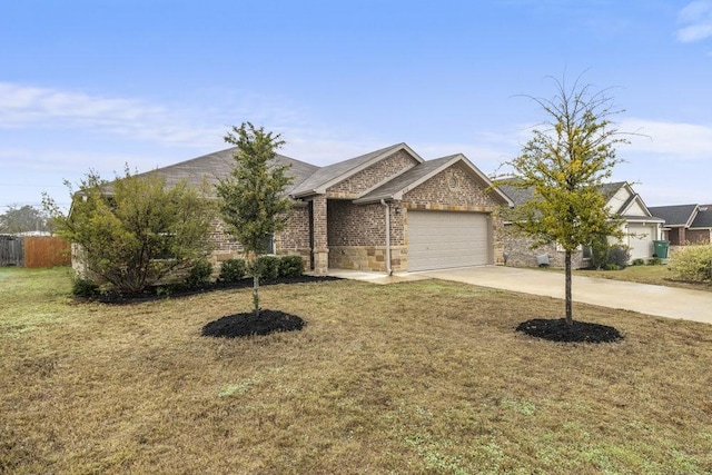 view of front facade featuring a front lawn and a garage