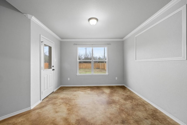 carpeted spare room with ornamental molding