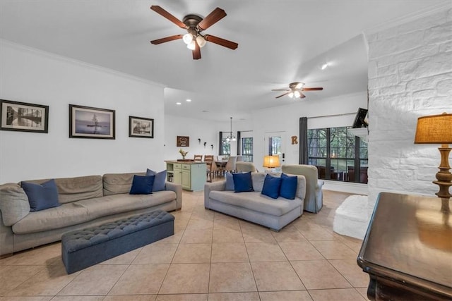 living room with ceiling fan, light tile patterned floors, and crown molding