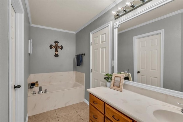 bathroom with tile patterned floors, ornamental molding, vanity, and a washtub