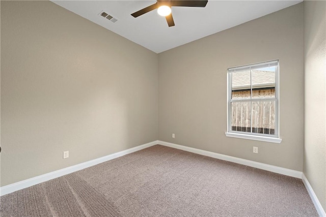 empty room with carpet flooring and ceiling fan