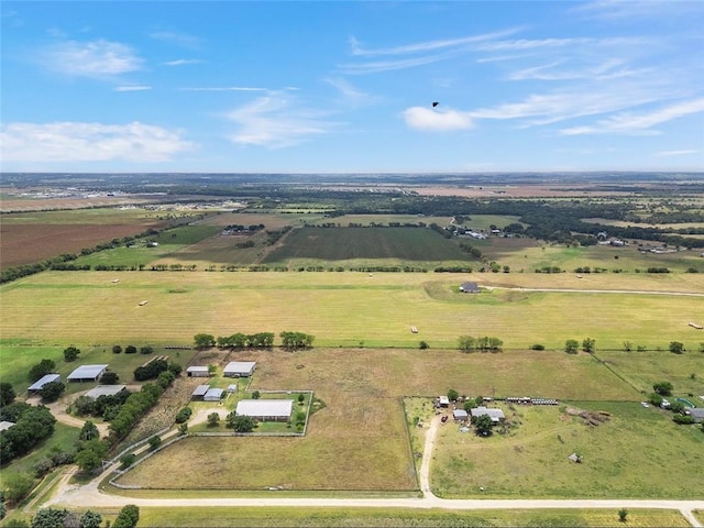 birds eye view of property featuring a rural view