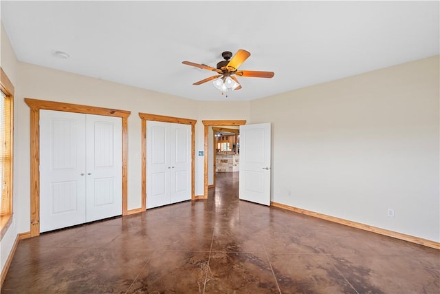 unfurnished bedroom featuring ceiling fan