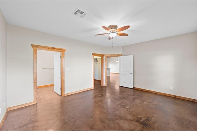 empty room featuring ceiling fan