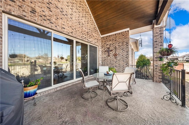 view of patio / terrace with grilling area and outdoor dining area