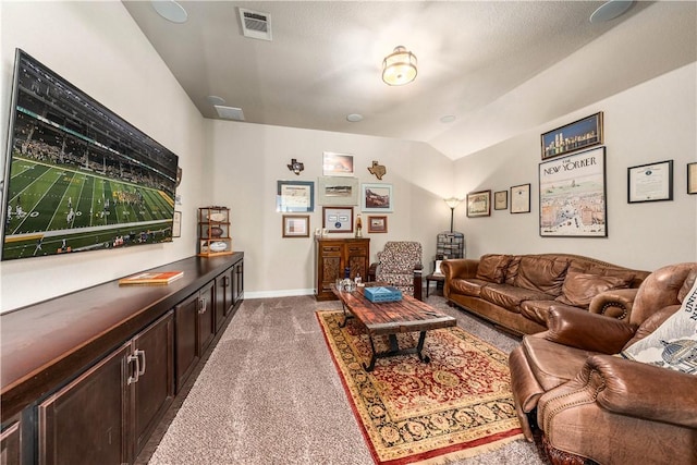 carpeted living room with visible vents, lofted ceiling, and baseboards