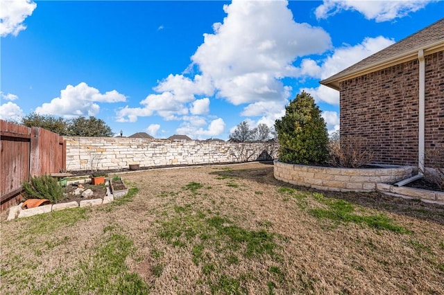 view of yard featuring fence