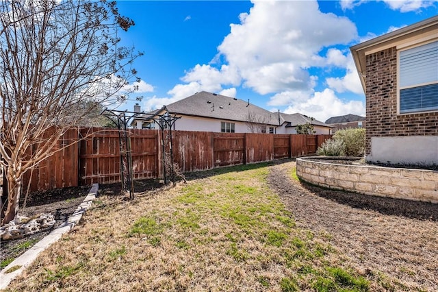 view of yard featuring fence