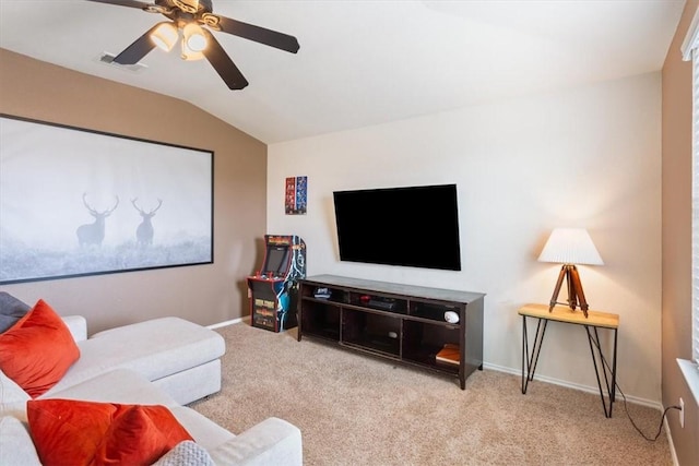 carpeted living room featuring baseboards, visible vents, vaulted ceiling, and a ceiling fan