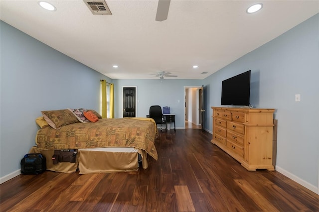 bedroom with dark wood-type flooring and ceiling fan