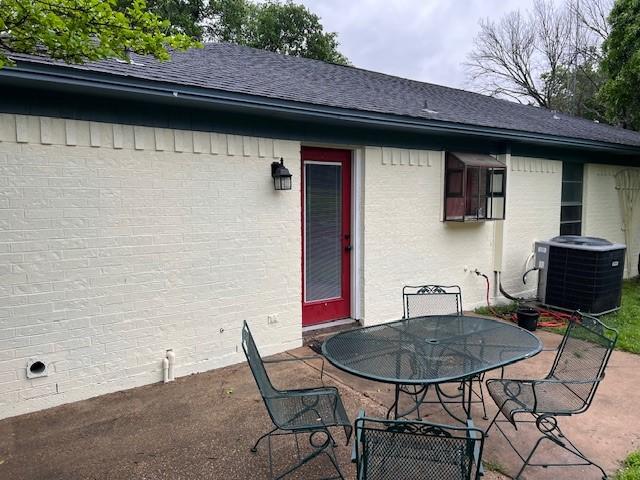 view of patio / terrace with central air condition unit