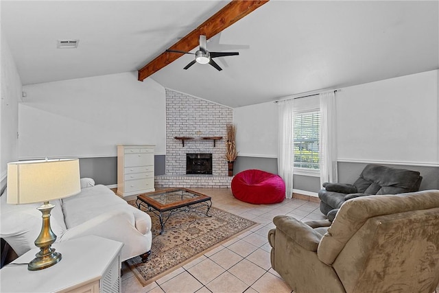 tiled living room with lofted ceiling with beams, ceiling fan, and a fireplace