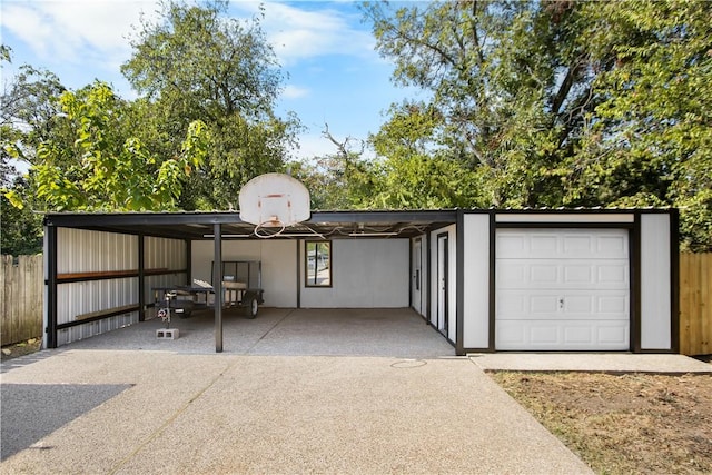 garage featuring a carport