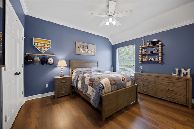 bedroom with dark wood-style floors, lofted ceiling, crown molding, and baseboards