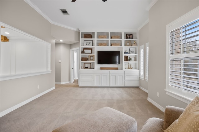 unfurnished living room featuring crown molding, baseboards, visible vents, and light colored carpet