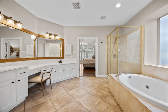 ensuite bathroom featuring visible vents, ensuite bath, tile patterned flooring, vanity, and a shower stall