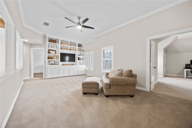 living room featuring visible vents, ornamental molding, a ceiling fan, light carpet, and baseboards