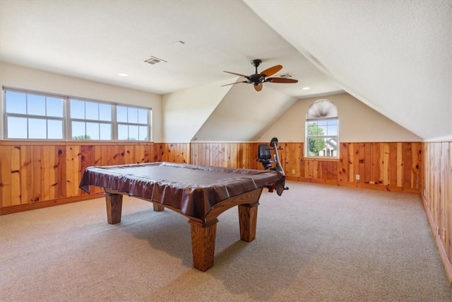 rec room featuring wood walls, lofted ceiling, billiards, ceiling fan, and light colored carpet