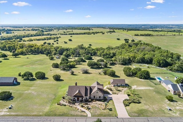 birds eye view of property featuring a rural view