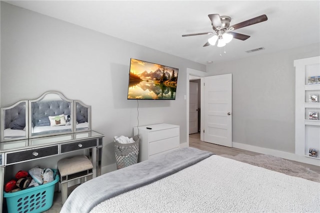 bedroom featuring light hardwood / wood-style flooring and ceiling fan