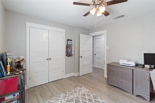 office area featuring ceiling fan and light wood-type flooring