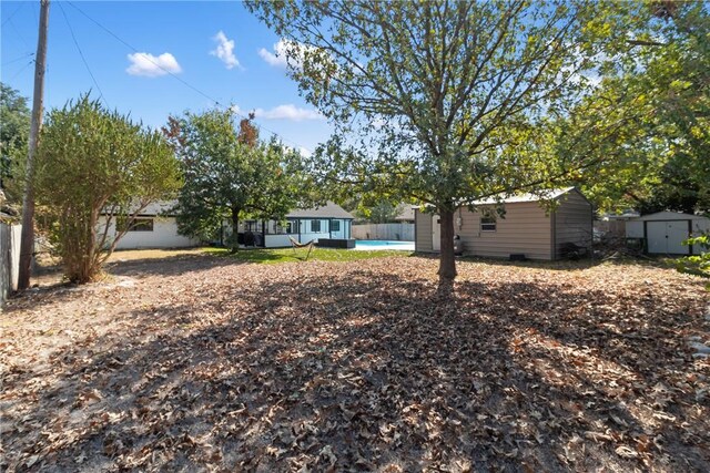 exterior space with a storage shed