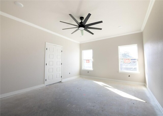 spare room with ceiling fan and ornamental molding