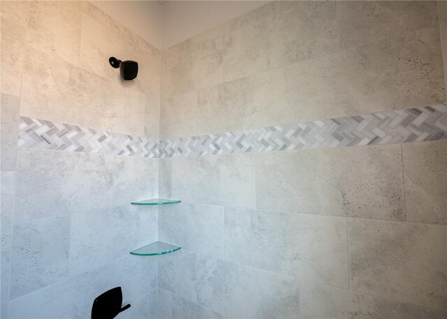 room details with a tile shower