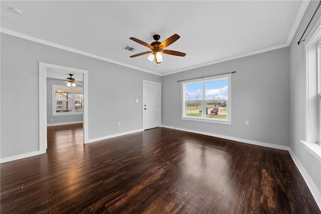 empty room with crown molding, ceiling fan, and dark wood-type flooring