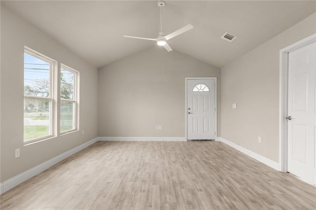 entrance foyer with light hardwood / wood-style flooring, vaulted ceiling, and ceiling fan