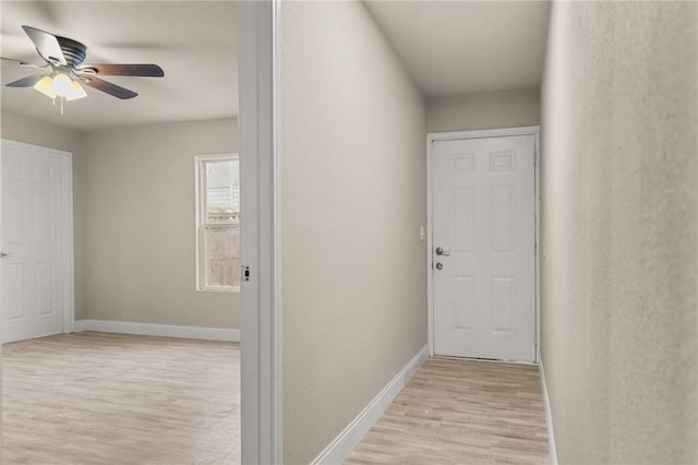 hallway featuring light hardwood / wood-style floors