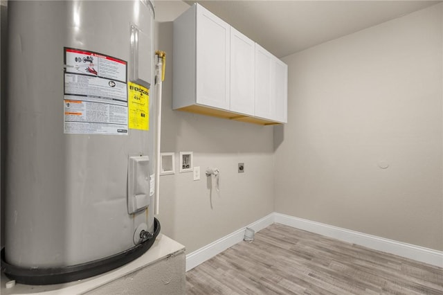 laundry room featuring cabinets, hookup for a washing machine, electric dryer hookup, water heater, and light hardwood / wood-style floors