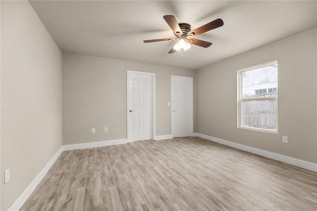 unfurnished bedroom featuring ceiling fan and light hardwood / wood-style floors