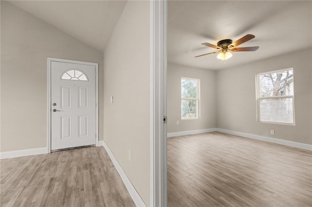 entrance foyer featuring plenty of natural light, light hardwood / wood-style floors, and ceiling fan