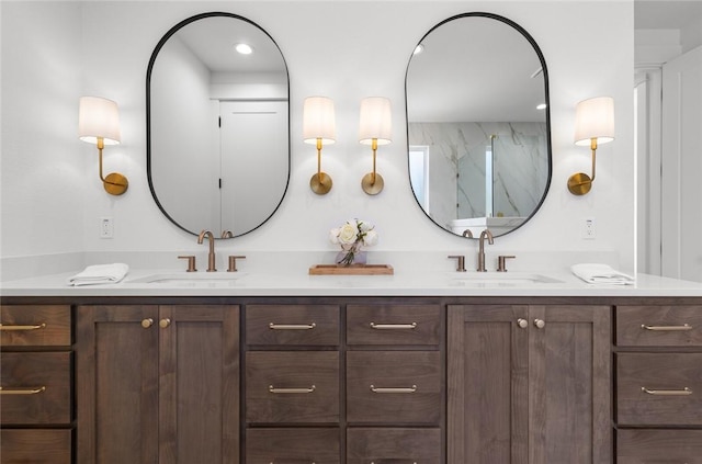 bathroom with vanity and walk in shower