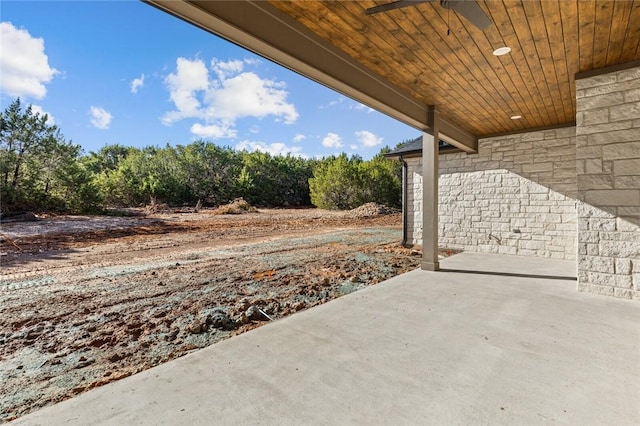 view of patio featuring ceiling fan