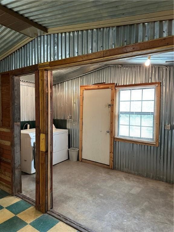 view of horse barn with independent washer and dryer