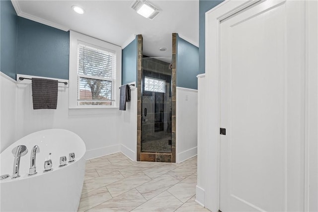 bathroom with crown molding and independent shower and bath