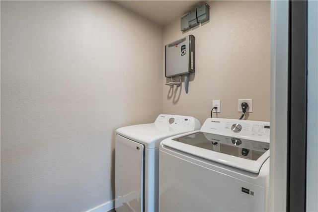 laundry area with separate washer and dryer