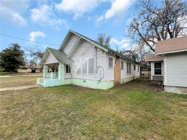 exterior space featuring a front lawn