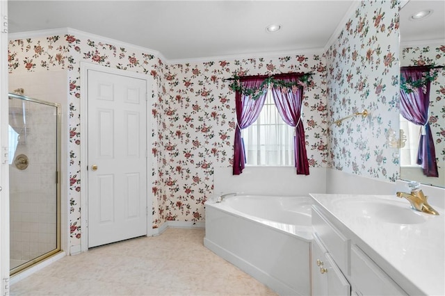 bathroom with vanity, independent shower and bath, and crown molding