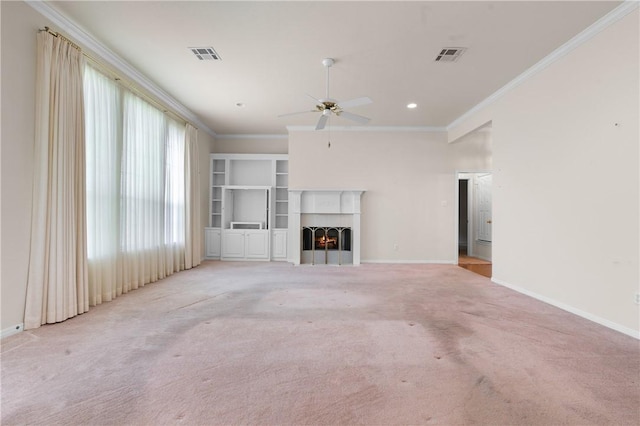 unfurnished living room with ceiling fan, light colored carpet, and ornamental molding