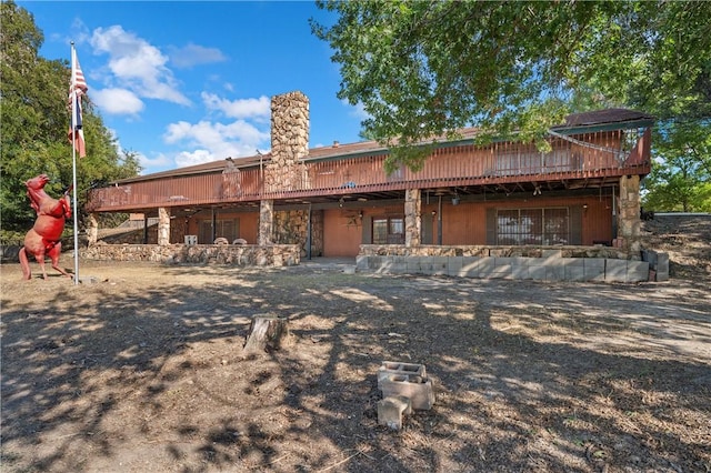 view of front of home featuring a wooden deck