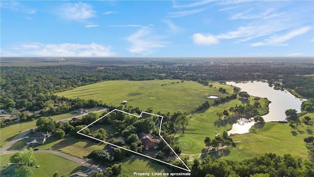 birds eye view of property with a rural view and a water view