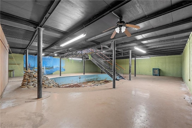 view of pool featuring ceiling fan