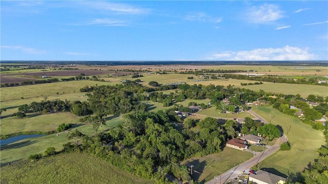 birds eye view of property featuring a rural view