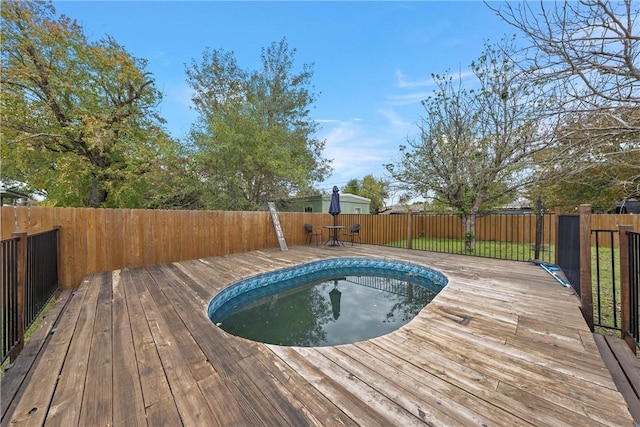 view of pool with a deck